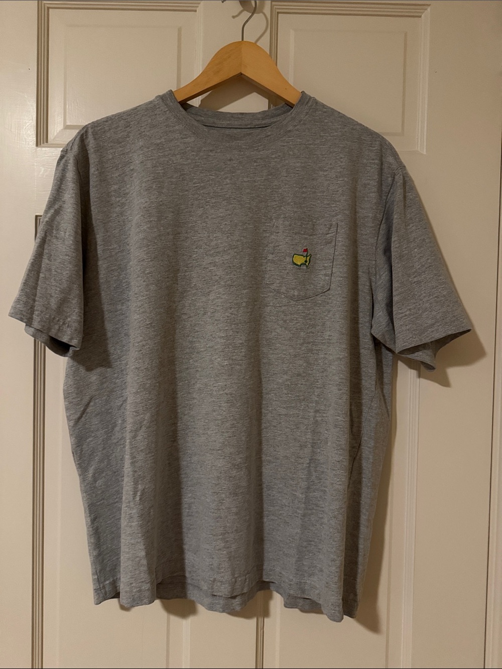 Masters Heather Gray Short Sleeve Pocket Tee with Small Green & Red Logo